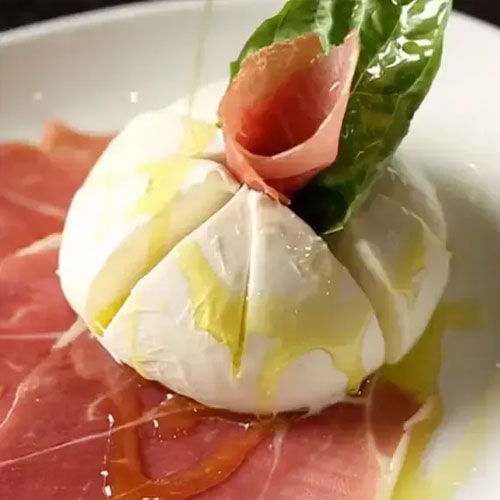 Burrata with prosciutto, fresh basil and olive oil